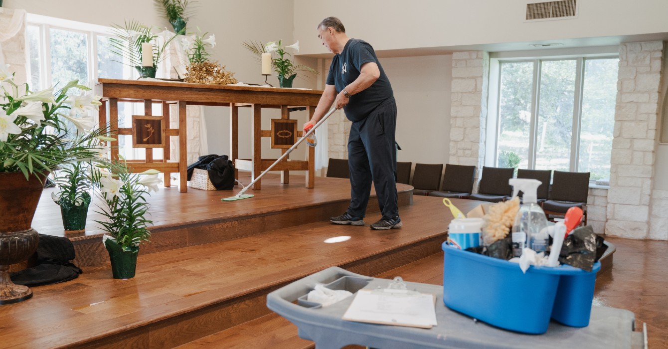 image of a man cleaning a sanctuary