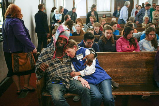 Haywood Street Congregation members participate in a worship service. 