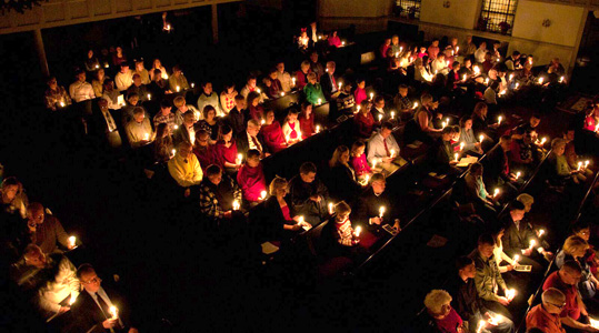 Congregation holding candles at Tabernacle Baptist Church